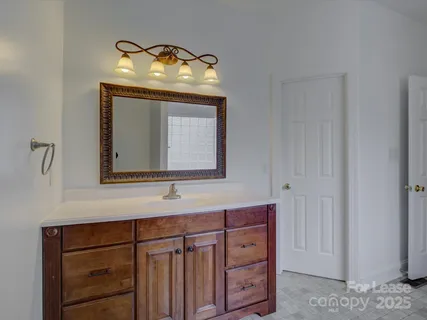 a view of front door with cabinet