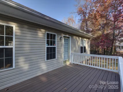 a view of a house with a deck