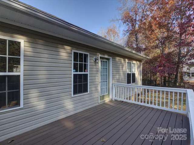 a view of a house with a deck