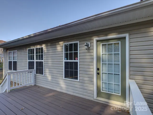 a view of front door deck of house
