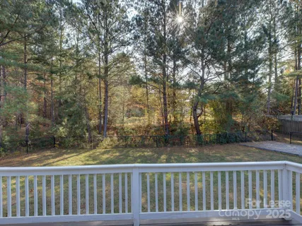 a view of backyard with green space