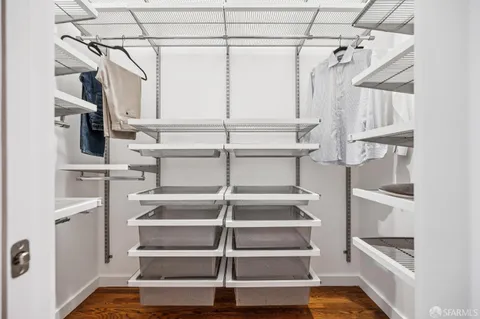 a view of a hallway with washer and dryer
