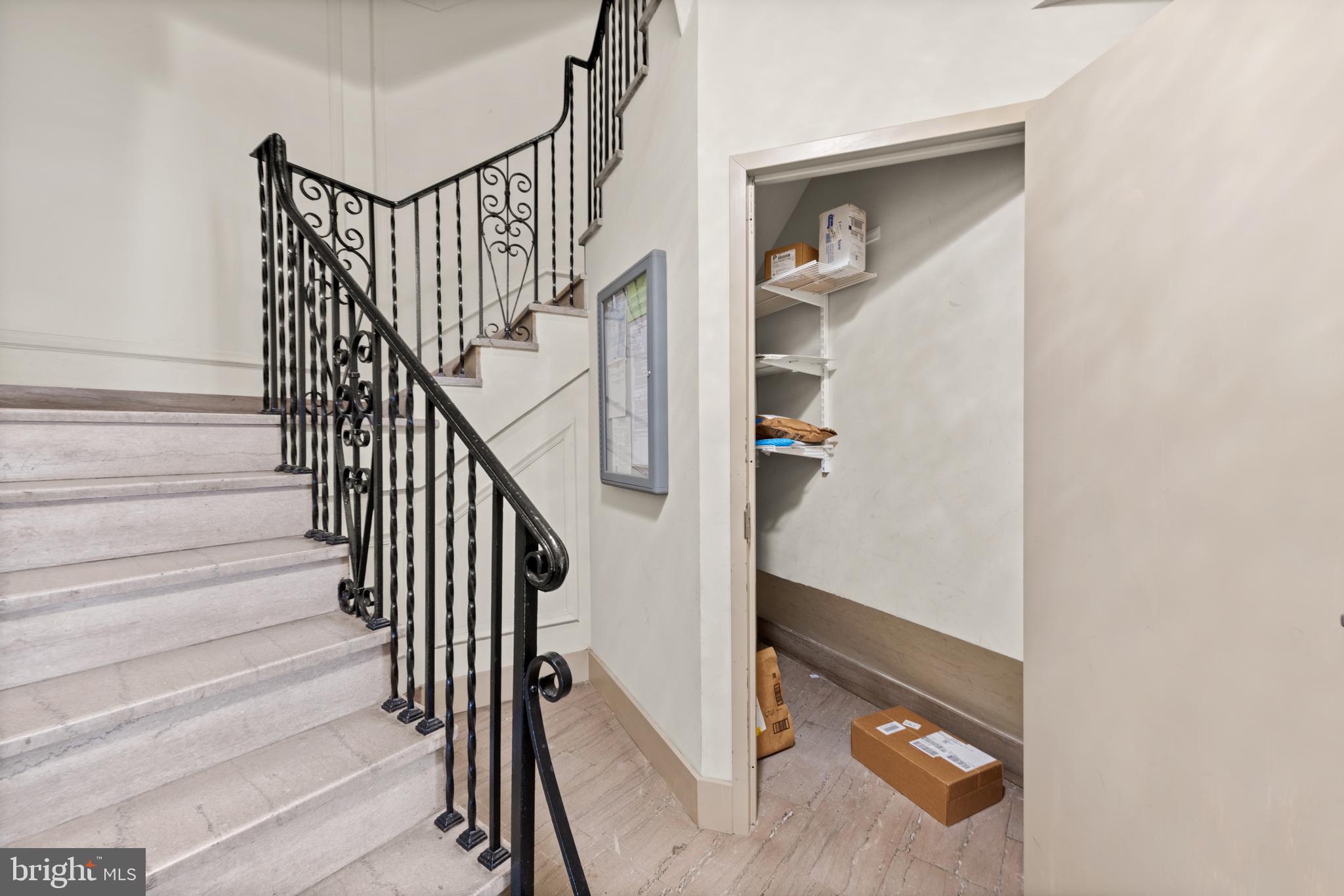 3446 Connecticut Avenue Northwest, Unit 401 Washington, DC 20008 - Photo 19 of 35 a view of staircase with railing and white walls