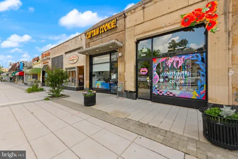 a building with sign board outdoor space