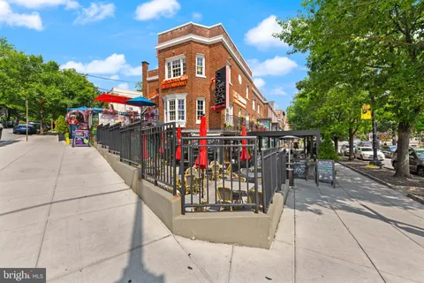 a view of a building with a street