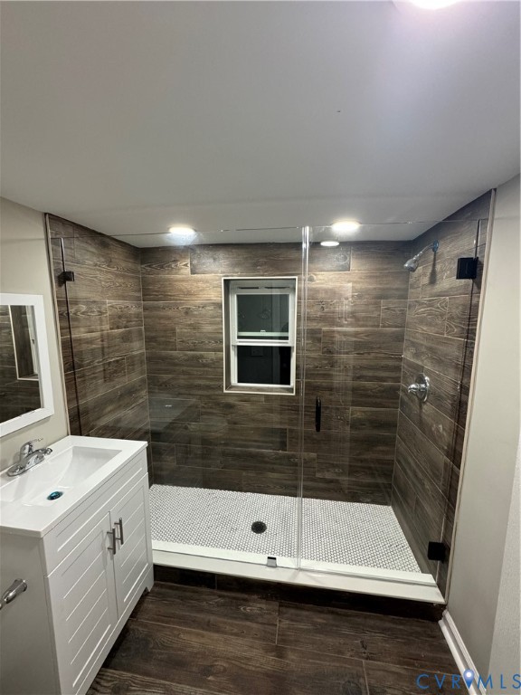 416 South Virginia Street Farmville, VA 23901 - Photo 11 of 33 a bathroom with a double vanity sink a toilet a mirror and bathtub