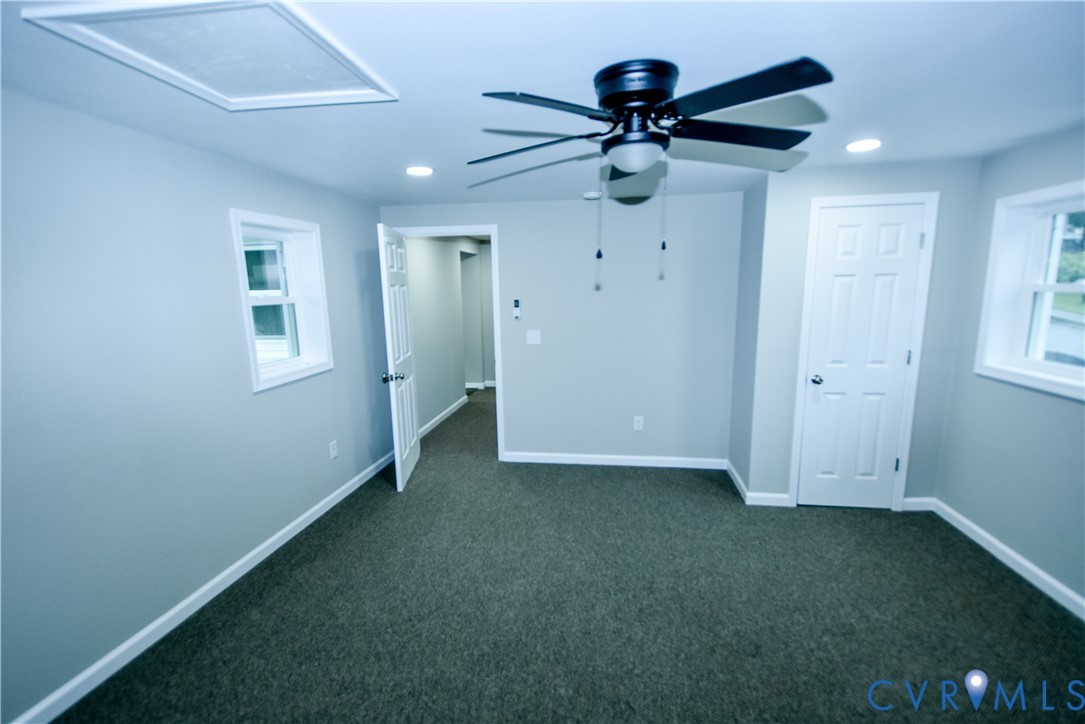 416 South Virginia Street Farmville, VA 23901 - Photo 12 of 33 an empty room with closet and a ceiling fan