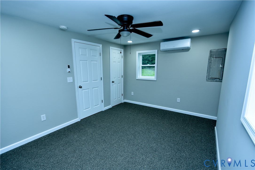 416 South Virginia Street Farmville, VA 23901 - Photo 29 of 33 a view of an empty room with a ceiling fan