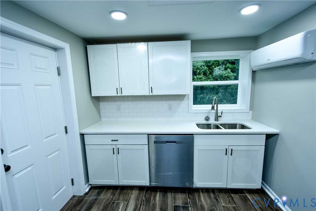 416 South Virginia Street Farmville, VA 23901 - Photo 5 of 33 a kitchen with sink cabinets and window