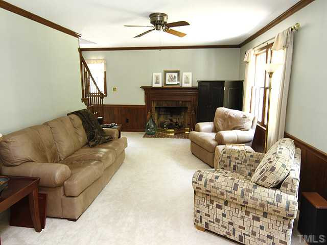 8904 Jeanew Court Raleigh, NC 27613 - Photo 7 of 25 Masonry fireplace is the center attraction to this large family room. Adjacent to family rm is secondary stairway. Around the corner is a mud room area to put down the booksacks, take of the shoes and hang up the keys before coming into your family rm. Den/Family/Great Room