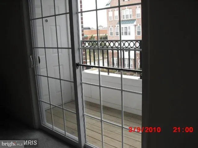 a view of a dining room with furniture and window