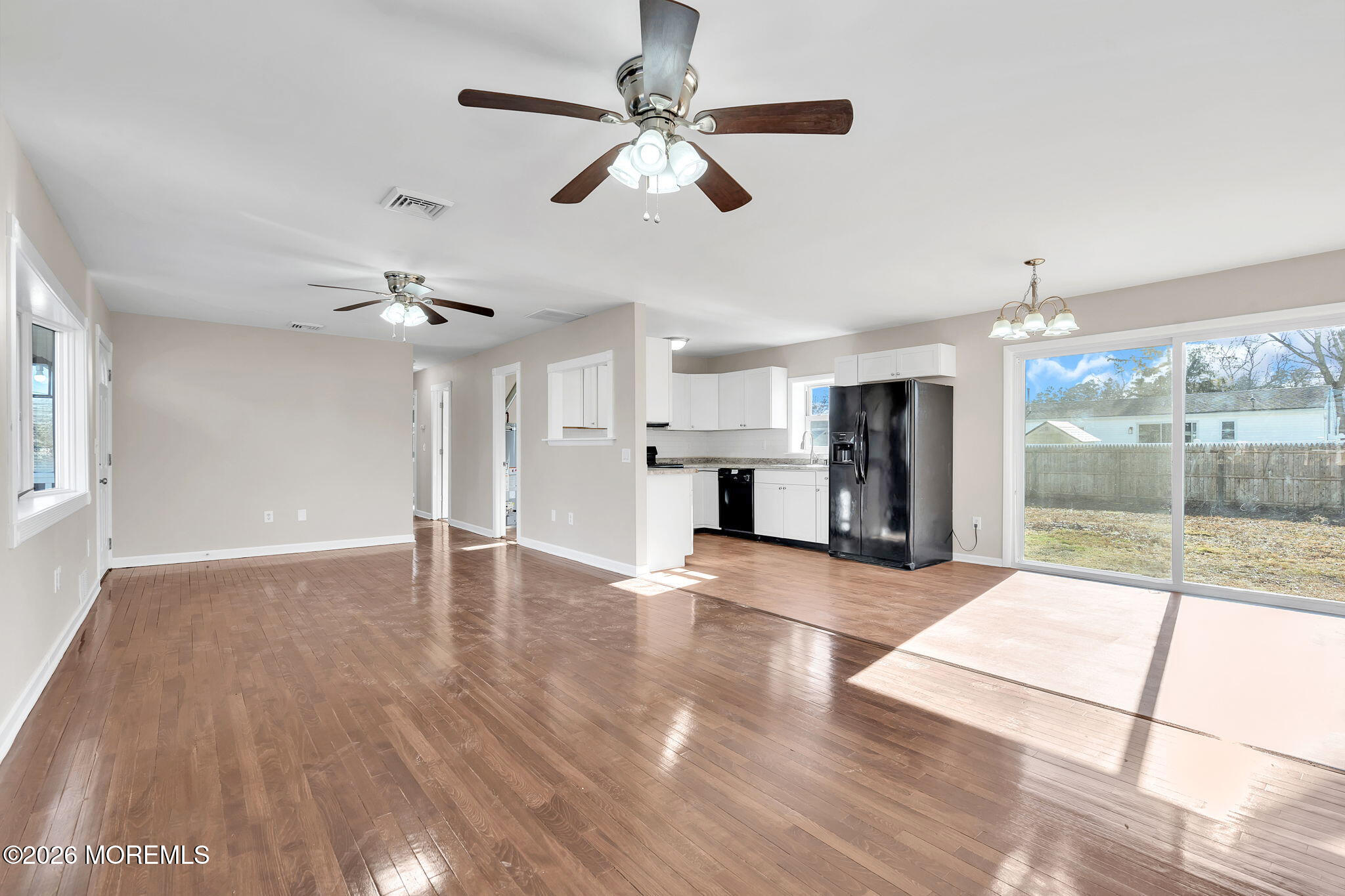 34 Dockage Road Bayville, NJ 08721 - Photo 14 of 31 a view of empty room with wooden floor and fan