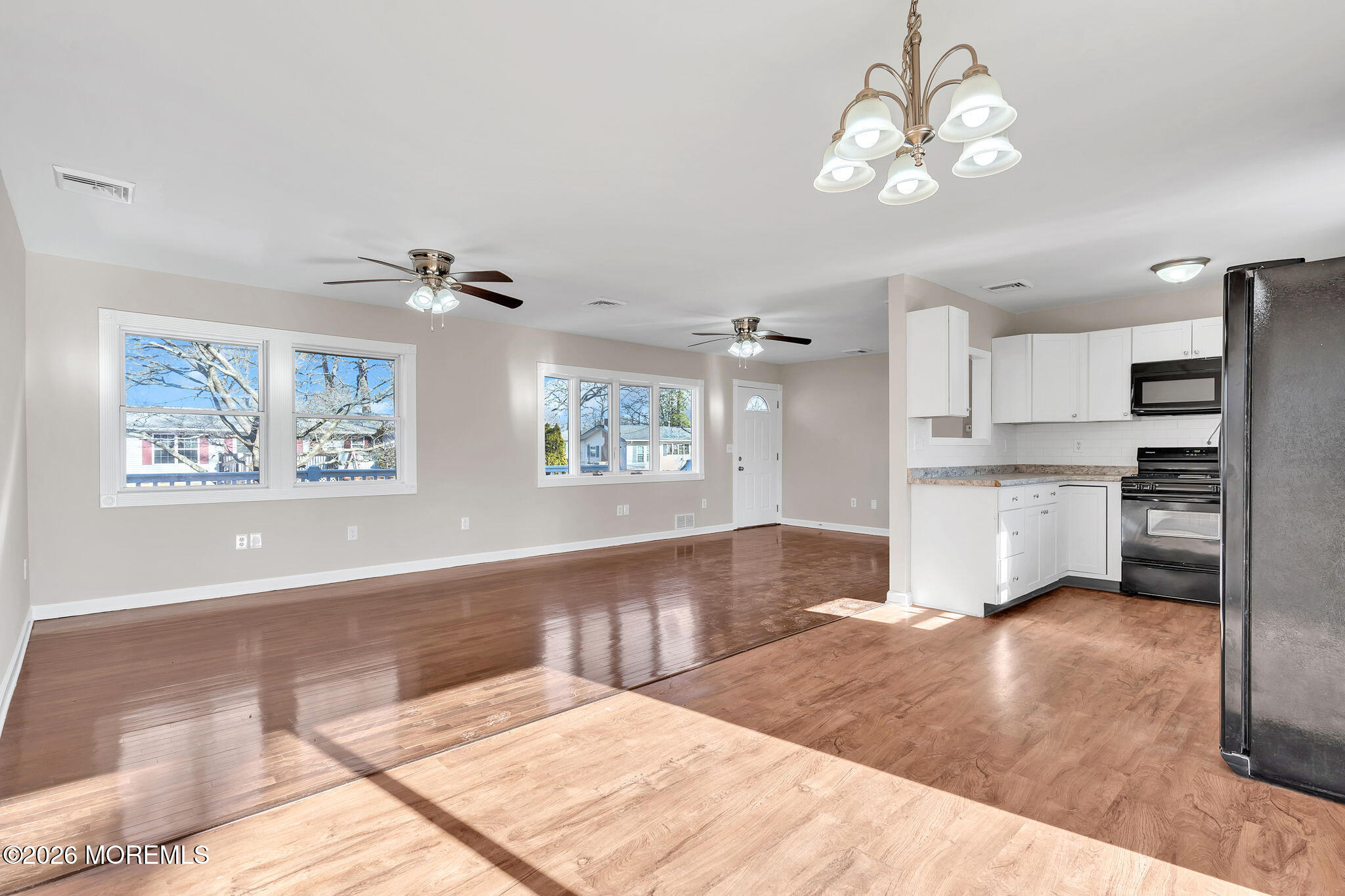 34 Dockage Road Bayville, NJ 08721 - Photo 17 of 31 a view of kitchen with sink and microwave