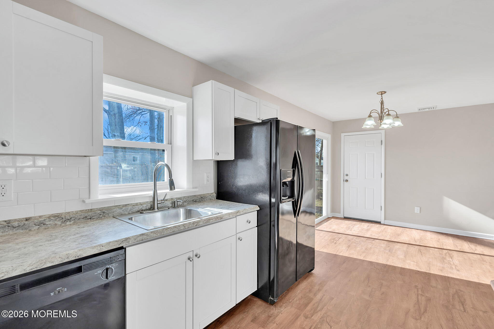 34 Dockage Road Bayville, NJ 08721 - Photo 20 of 31 a kitchen with stainless steel appliances granite countertop a sink refrigerator and cabinets