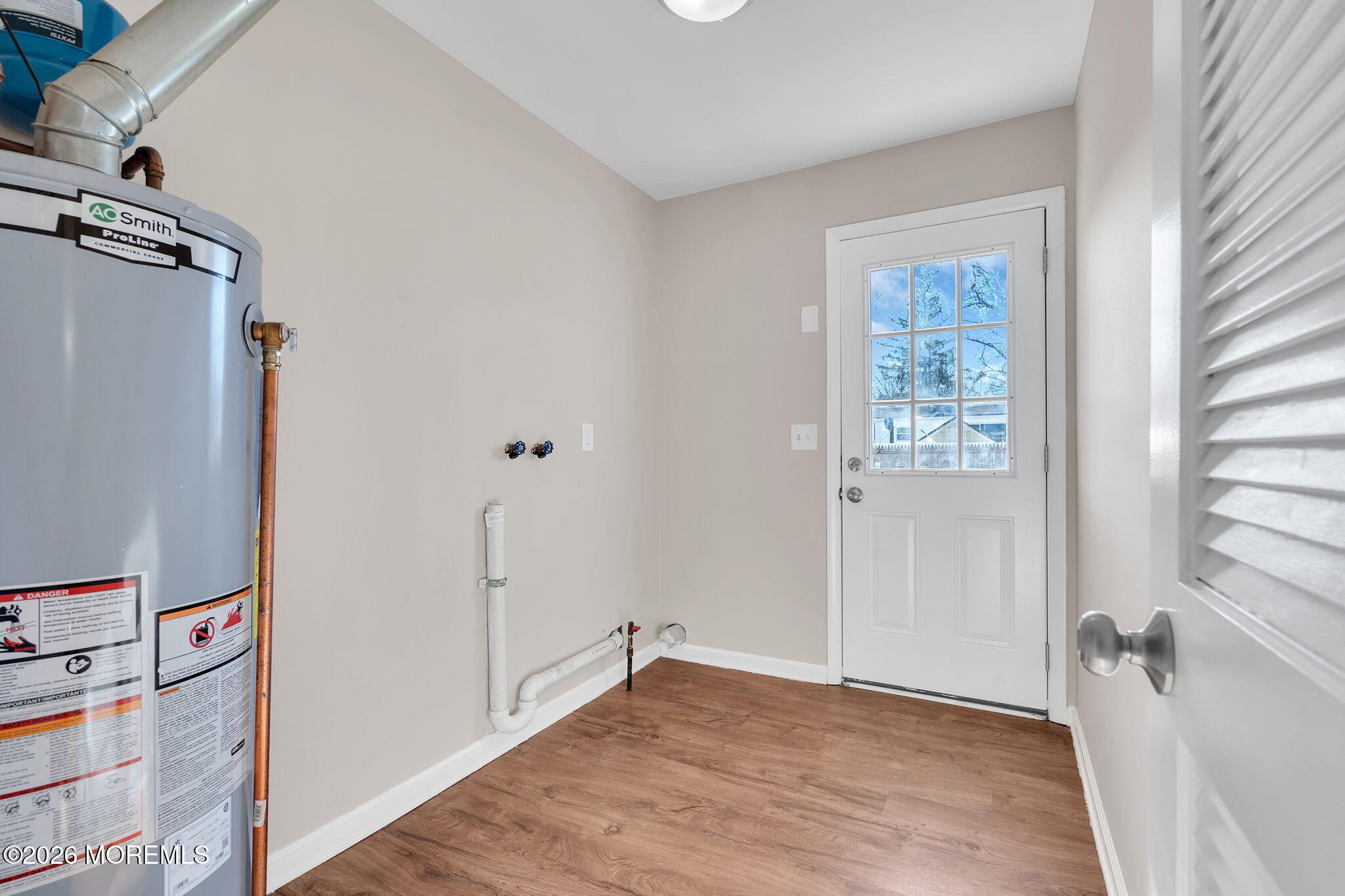 34 Dockage Road Bayville, NJ 08721 - Photo 24 of 31 a view of empty room with wooden floor and fan