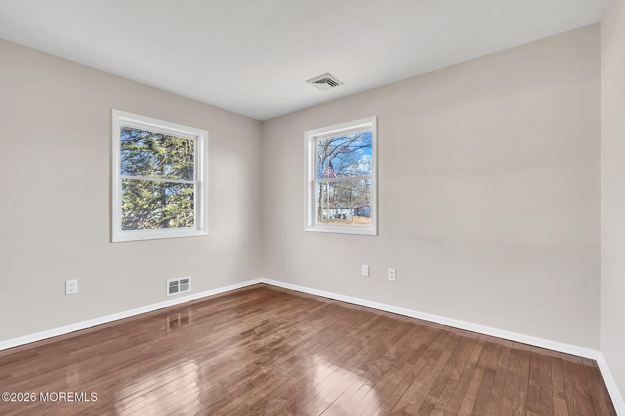 34 Dockage Road Bayville, NJ 08721 - Photo 28 of 31 a view of a big room with wooden floor and windows