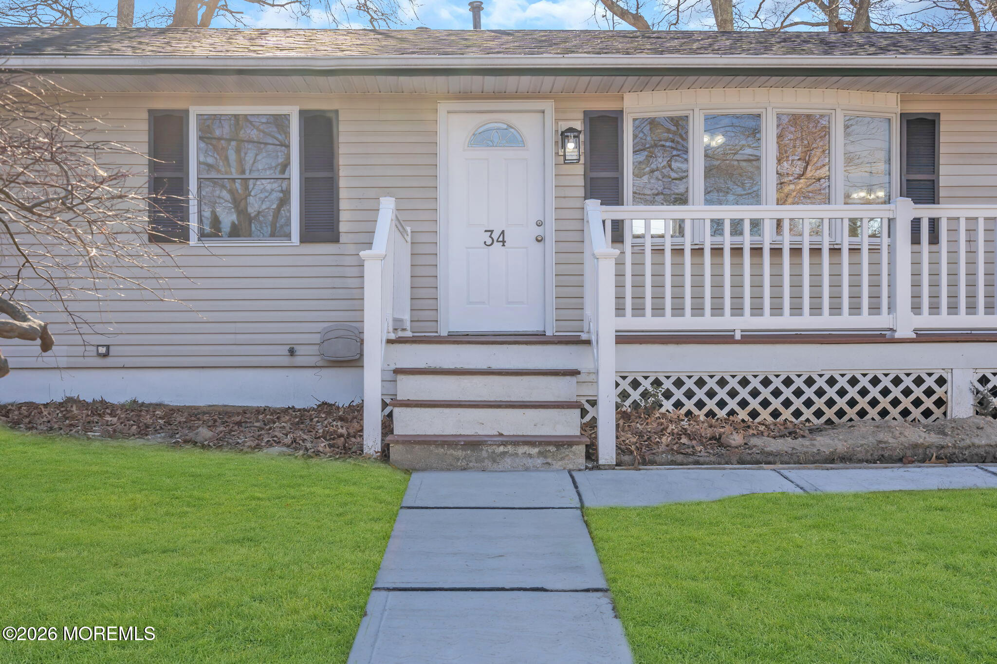 34 Dockage Road Bayville, NJ 08721 - Photo 9 of 31 a front view of a house with a garden