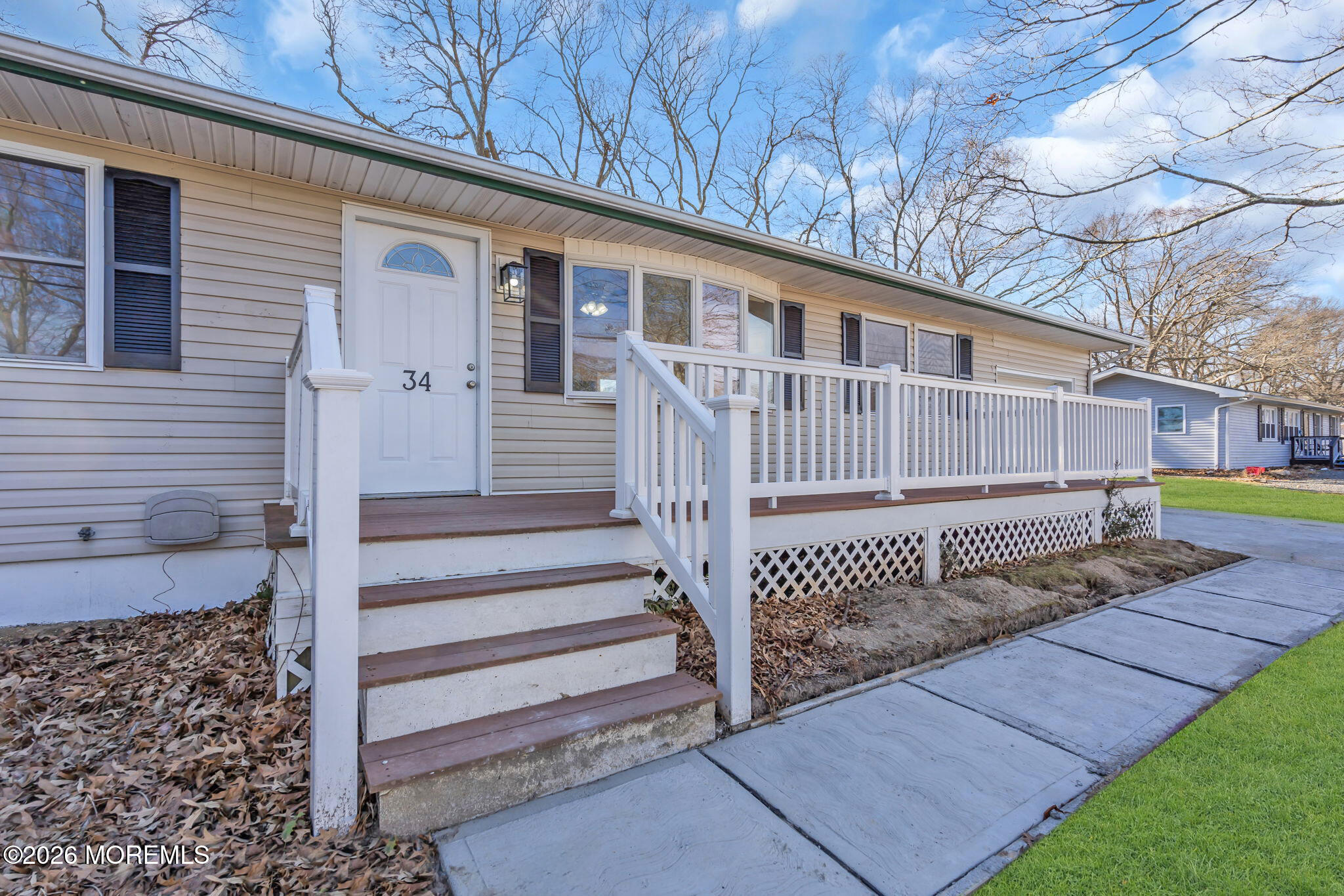 34 Dockage Road Bayville, NJ 08721 - Photo 10 of 31 a front view of a house with a yard and fence