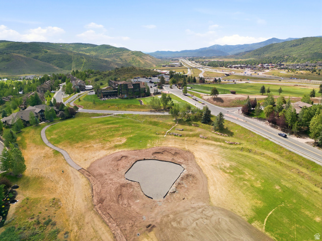 3535 Homestead Road Park City, UT 84098 - Photo 81 of 81 Expansive lot featuring a prepared pad for construction and a surrounding grassy area