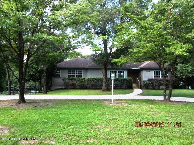 2026 Cornell Road Middleburg, FL 32068 - Photo 3 of 26 a house that has a garden