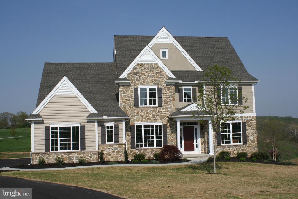 3 Arc Drive Rising Sun, MD 21911 - Photo 1 of 4 front view of a house with a yard