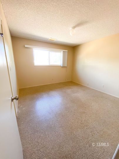 516 West Wasp Avenue Ridgecrest, CA 93555 - Photo 19 of 25 an empty room with windows