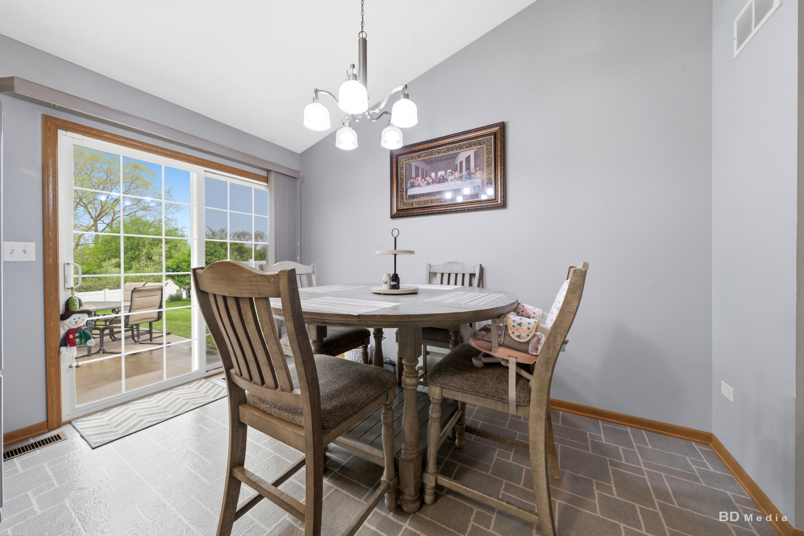 25606 Jonquil Lane Monee, IL 60449 - Photo 14 of 38 a view of a dining room with furniture window and outside view