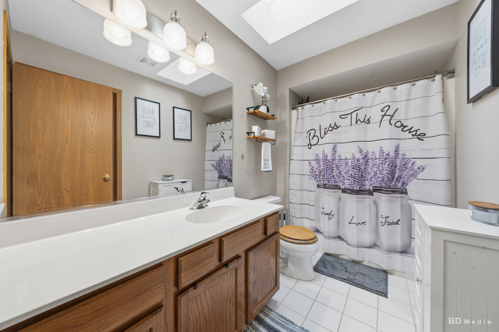25606 Jonquil Lane Monee, IL 60449 - Photo 17 of 38 a spacious bathroom with a sink a toilet a mirror and shower