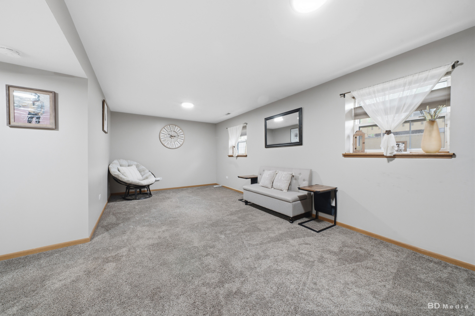 25606 Jonquil Lane Monee, IL 60449 - Photo 22 of 38 a living room with furniture and a lamp