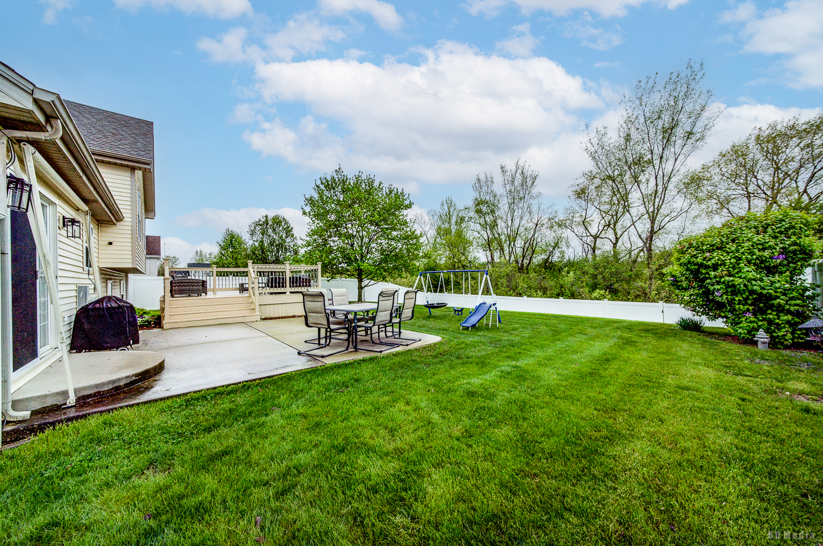 25606 Jonquil Lane Monee, IL 60449 - Photo 30 of 38 a view of backyard with swimming pool and sitting area