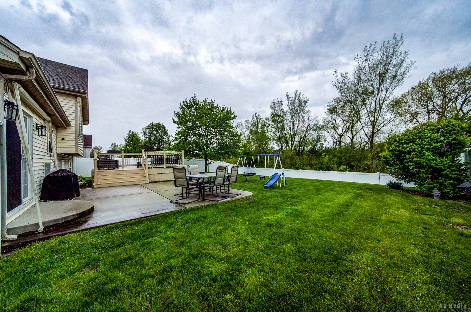 25606 Jonquil Lane Monee, IL 60449 - Photo 35 of 38 a view of a backyard with sitting area