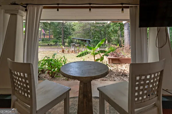 a kitchen with sink stove and cabinets