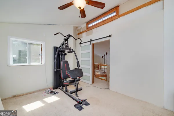 a view of a lake with a tree