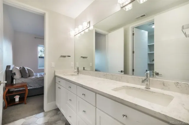 a bathroom with a bathtub and shower