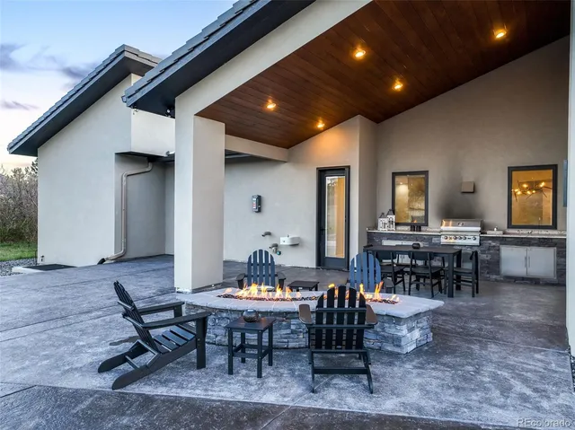 a view of a city with lush green forest