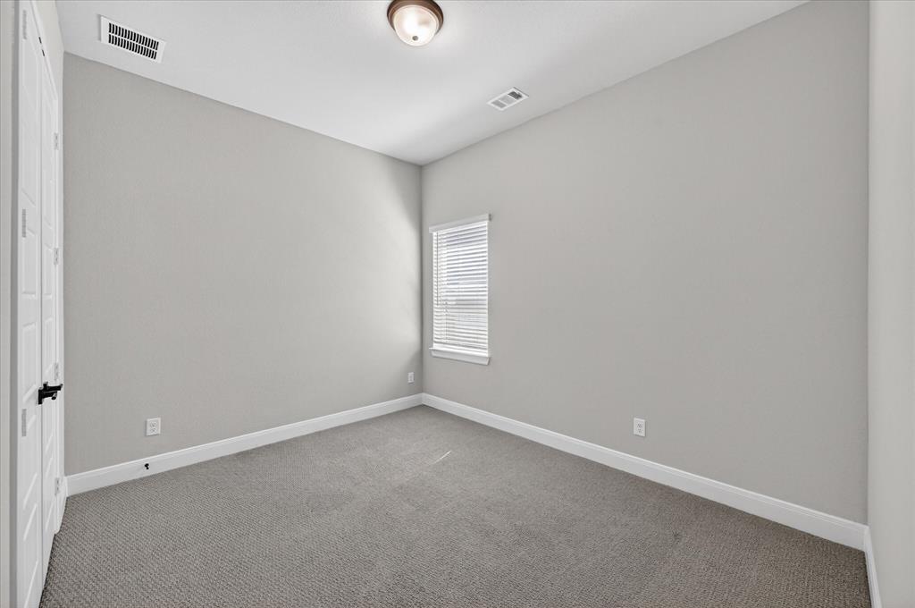 2237 Pika Road Northlake, TX 76247 - Photo 27 of 37 Carpeted room with neutral wall tones and a single window