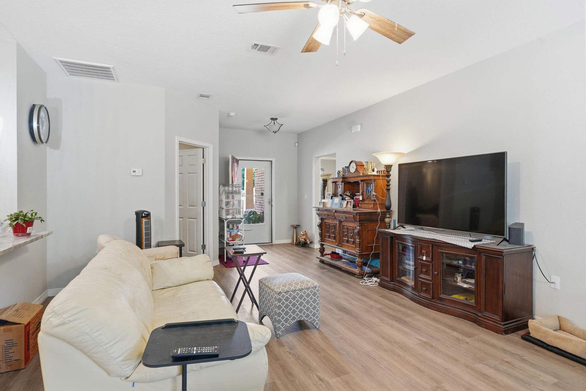 2012 North Pearl Street Crestview, FL 32536 - Photo 10 of 25 a living room with furniture and a flat screen tv