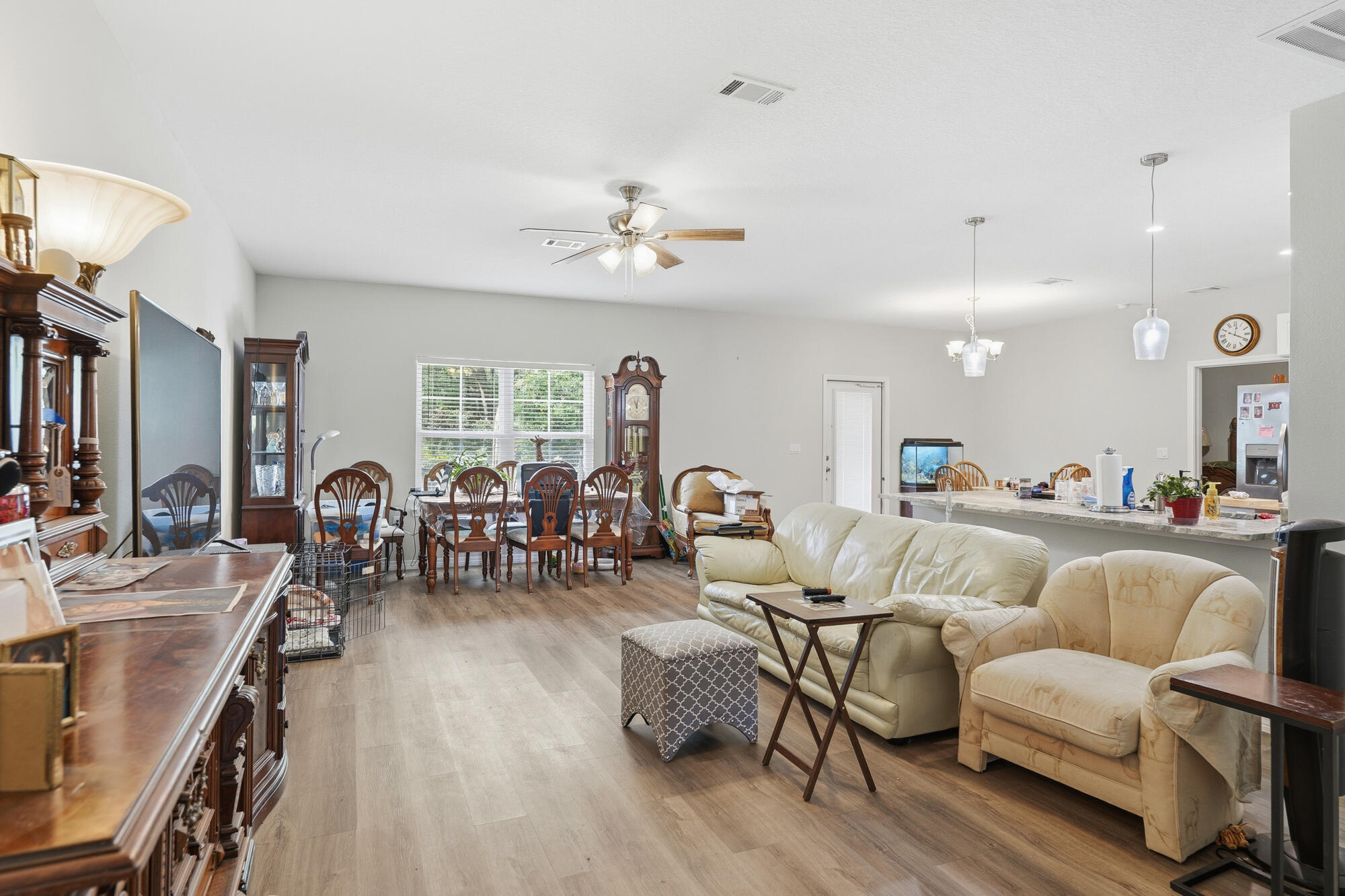 2012 North Pearl Street Crestview, FL 32536 - Photo 12 of 25 a living room with furniture and wooden floor