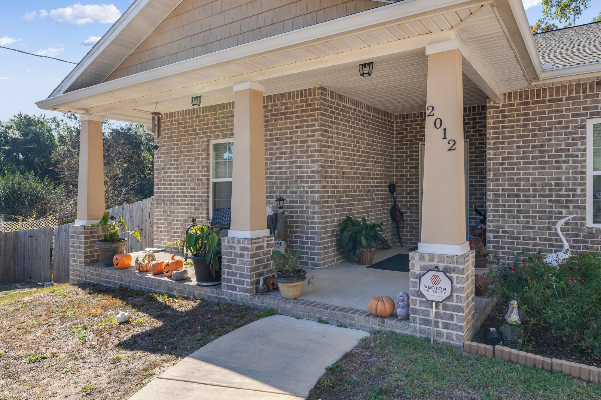 2012 North Pearl Street Crestview, FL 32536 - Photo 3 of 25 a front view of a house with patio