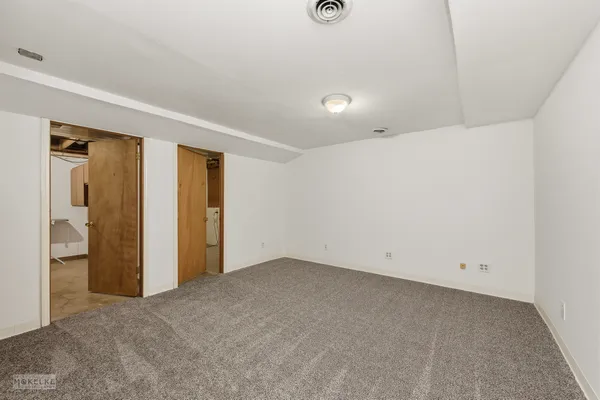 an empty room with closet