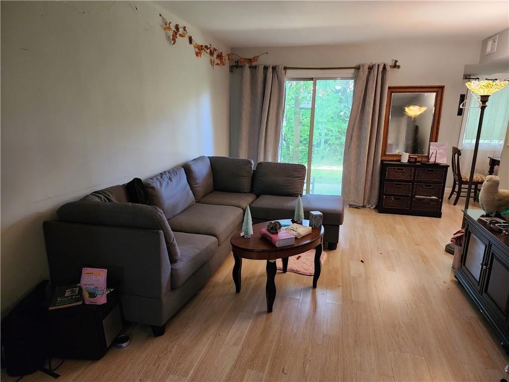 26 Cooper Road, Unit 504 Poughkeepsie, NY 12603 - Photo 1 of 1 Living room featuring light hardwood / wood-style floors