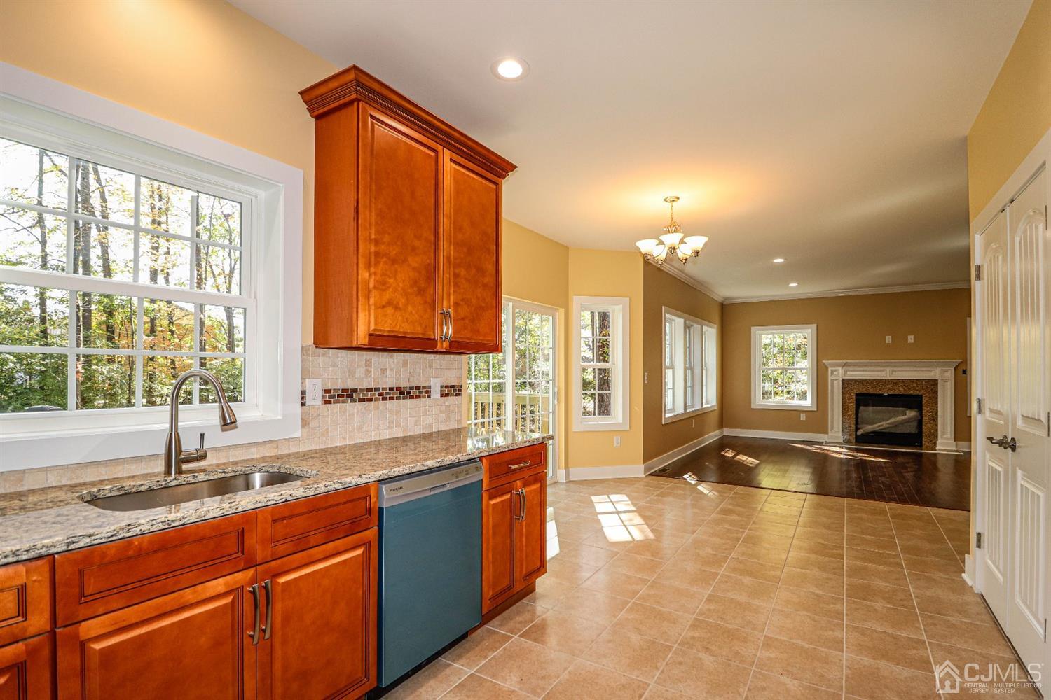 1834 Oak Road North Brunswick, NJ 08902 - Photo 12 of 39 View of eating area of kitchen leading into the warm and inviting family room.
