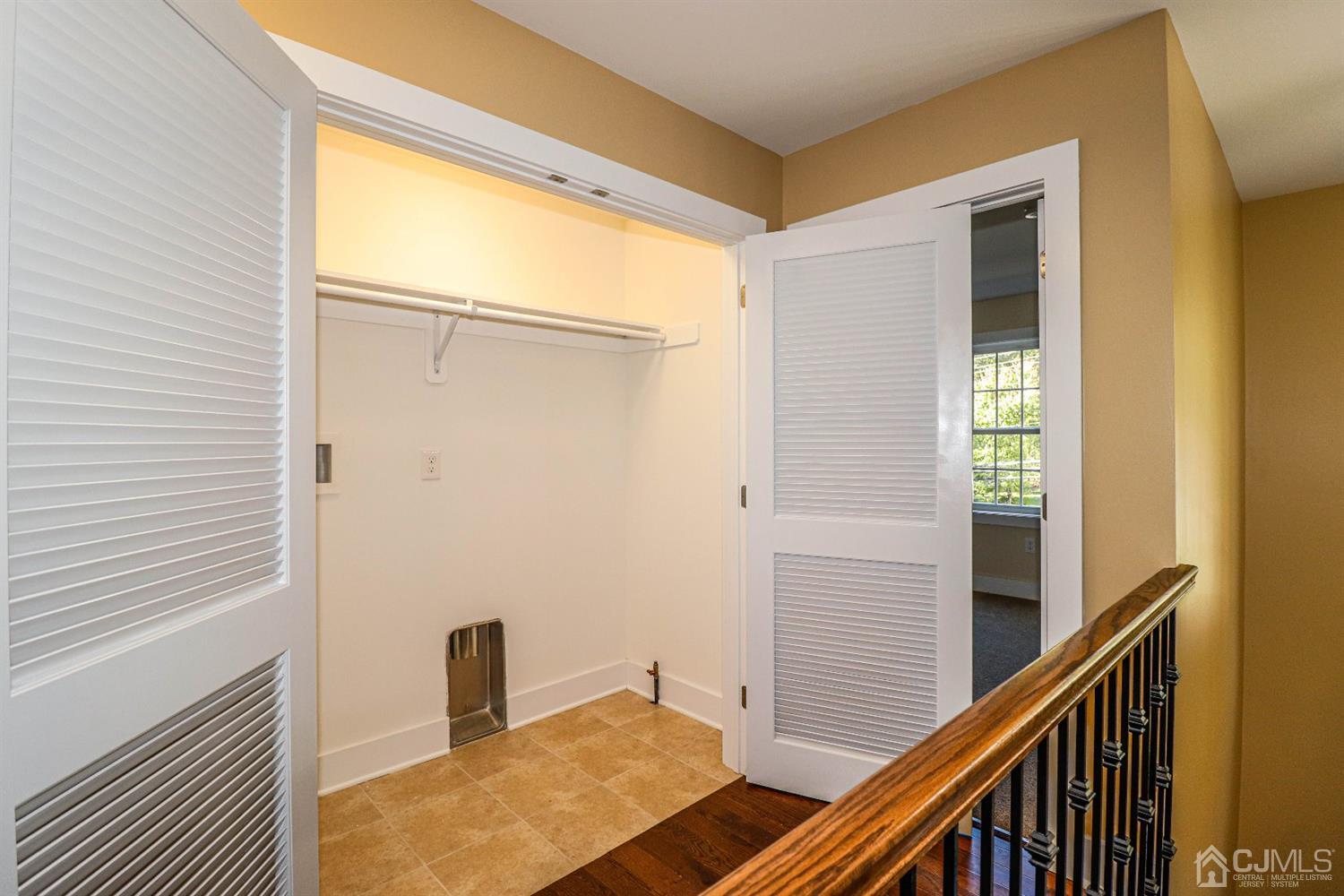 1834 Oak Road North Brunswick, NJ 08902 - Photo 21 of 39 The hook up for the washer and dryer are also in the hallway on upper level.
