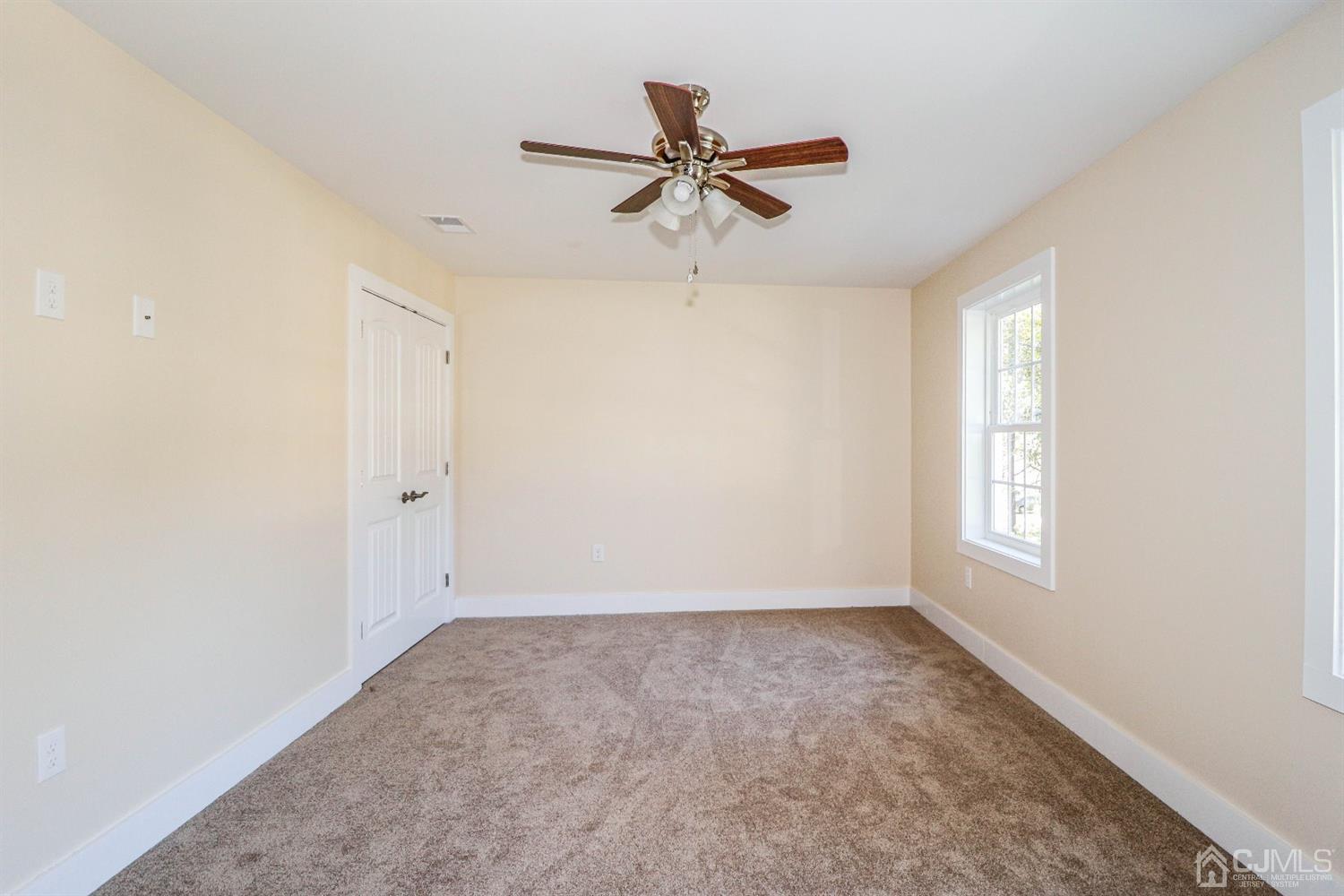 1834 Oak Road North Brunswick, NJ 08902 - Photo 30 of 39 Third bedroom, also features wall to wall carpeting, ceiling fan and double closet.