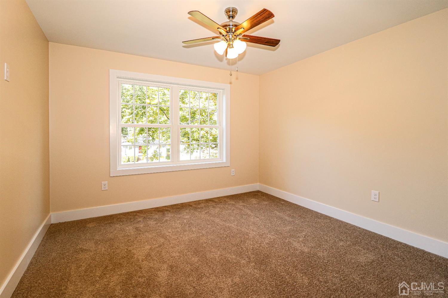 1834 Oak Road North Brunswick, NJ 08902 - Photo 31 of 39 Fourth bedroom, the same, wall to wall carpeting, ceiling fan and double closet.