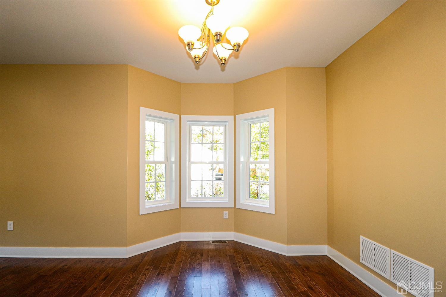 1834 Oak Road North Brunswick, NJ 08902 - Photo 8 of 39 The Dining room windows make this sunlit room very cheery and perfect for entertaining.