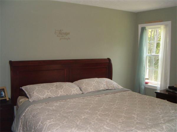 197 Fisherdick Road Ware, MA 01082 - Photo 18 of 30 a large bed sitting in a bedroom next to a window