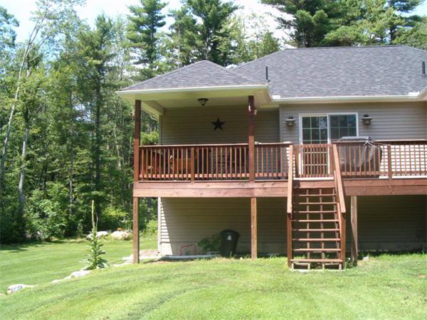 197 Fisherdick Road Ware, MA 01082 - Photo 4 of 30 a front view of a house with a yard