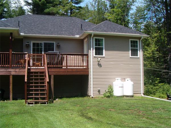 197 Fisherdick Road Ware, MA 01082 - Photo 5 of 30 a front view of a house with a garden