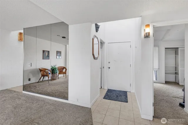 a view of room with window and glass door